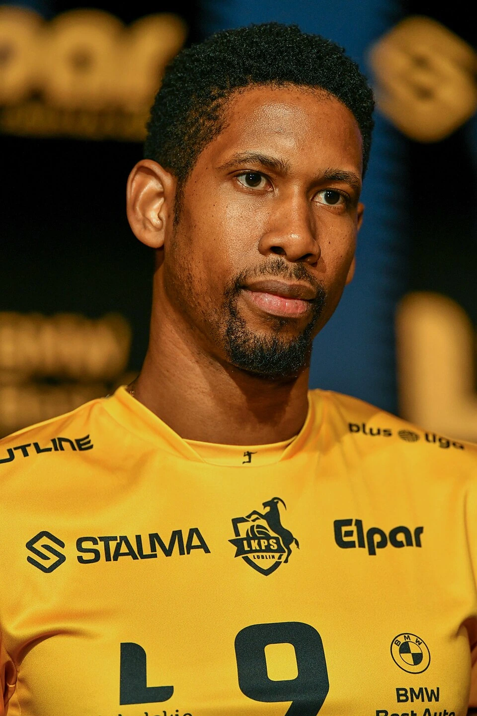 Wilfredo León Venero in a yellow volleyball jersey during a portrait photo.