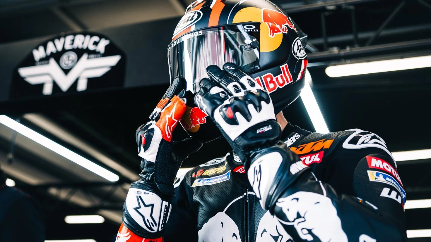 Maverick Viñales preparing in racing gear before a MotoGP session