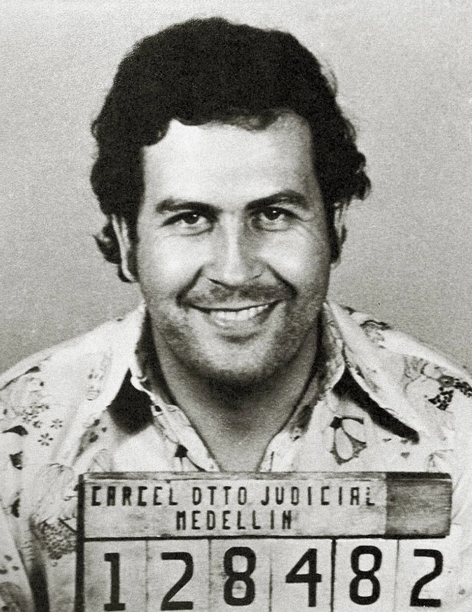 Mugshot-style black-and-white portrait of Gustavo de Jesús Gaviria Rivero